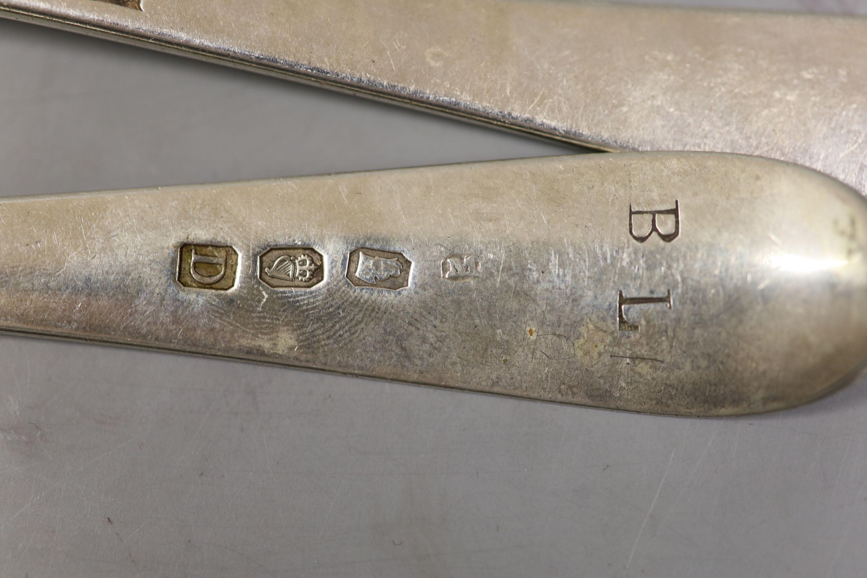 Nine assorted 18th and 19th century silver table and desert spoons, various dates and makers